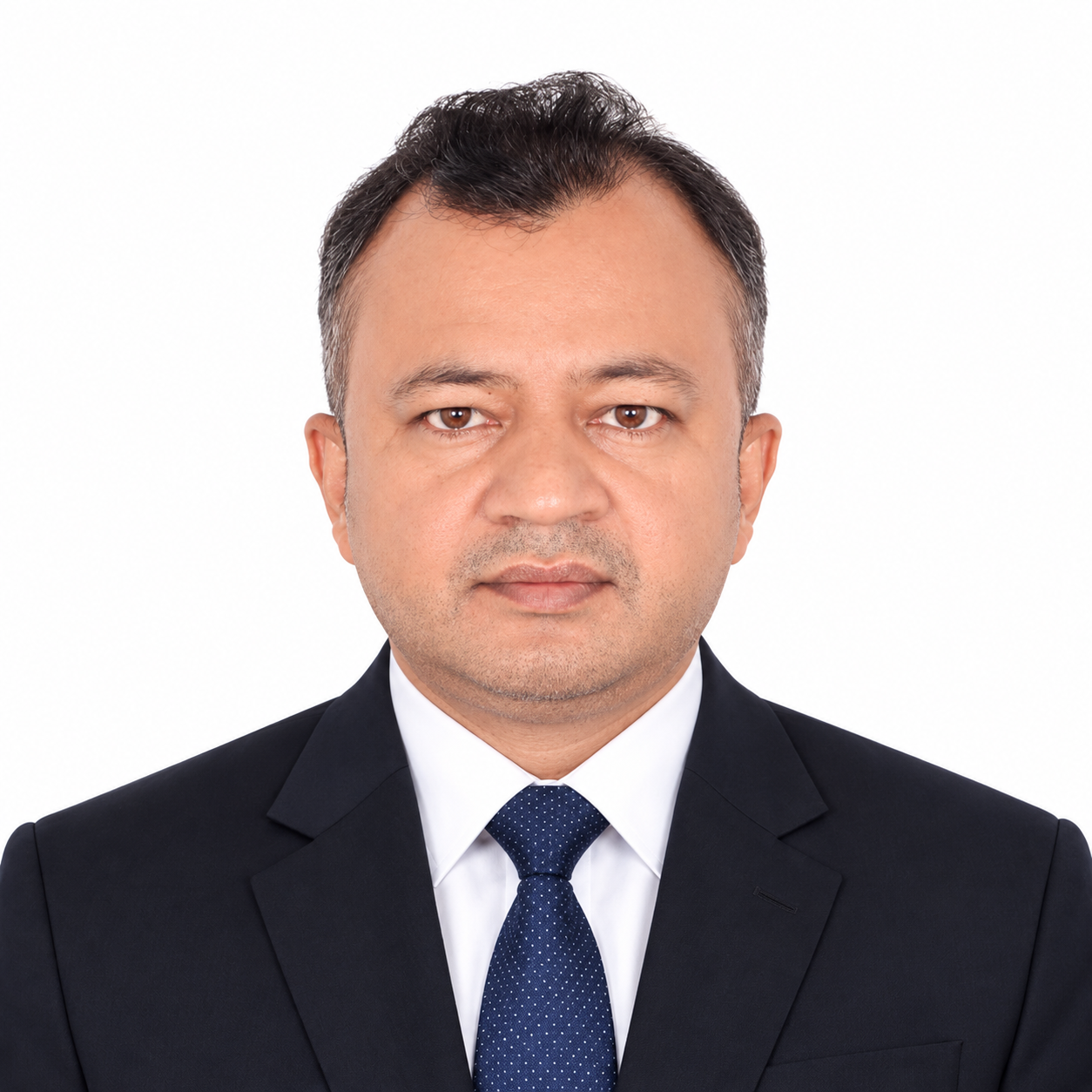 Partha Banik in a suit and tie